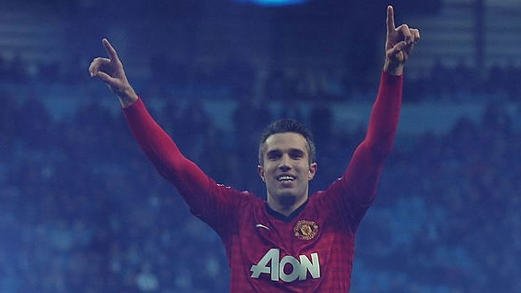 Selebarsi Van Persie setelah robek gawang Man City. Copyright: © John Peters/Man Utd via Getty Images