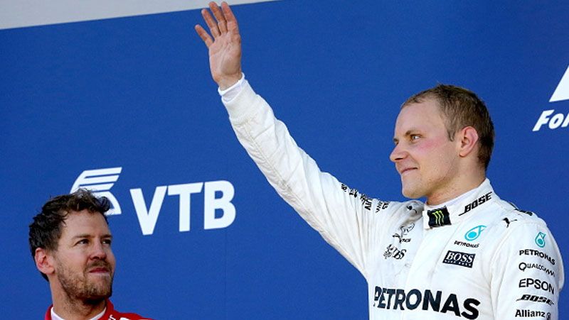 Valtteri Bottas berada di atas podium GP Rusia bersama Sebastian Vettel. Copyright: © Alexander Demianchuk\TASS via Getty Images