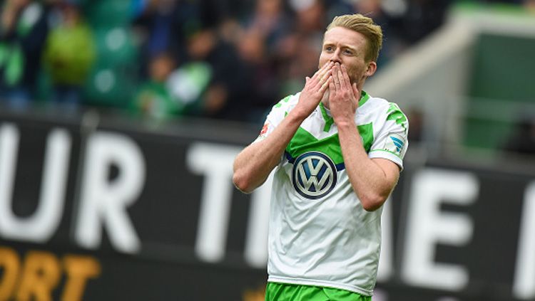 Selebrasi Andre Schuerrle saat masih bersergam Wolfsburg. Copyright: © Nigel Treblin/Bongarts/Getty Images