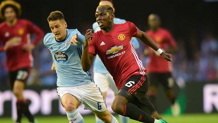 Paul Pogba berusaha melewati salah satu pemain Celta Vigo. Copyright: &copy; Twitter @SquawkaNews