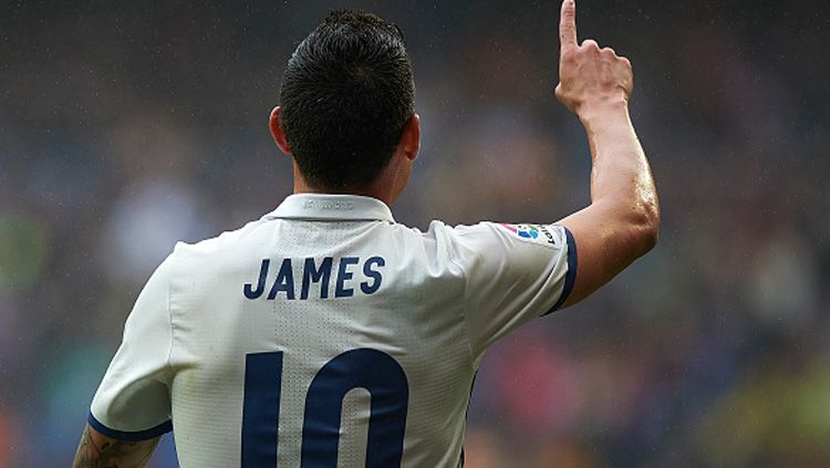 Pemain sepak bola Real Madrid, James Rodriguez, kabarnya tengah jadi rebutan dua raksasa Liga Inggris, yaitu Manchester United dan Tottenham Hotspur. Copyright: © fotopress/Getty Images