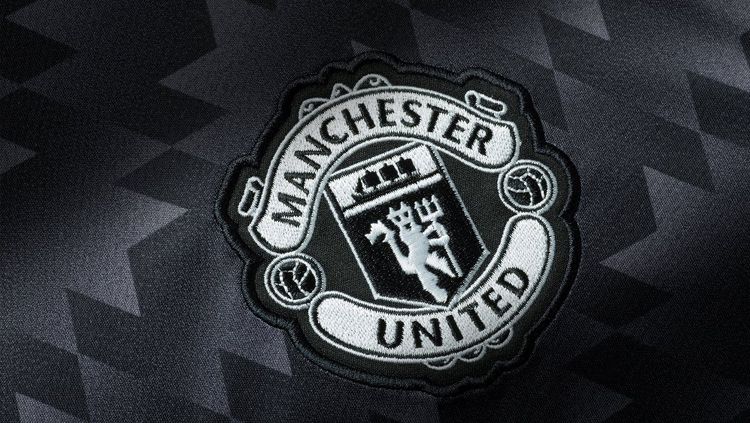 Kostum tandang Manchester United. Copyright: © manunited.com