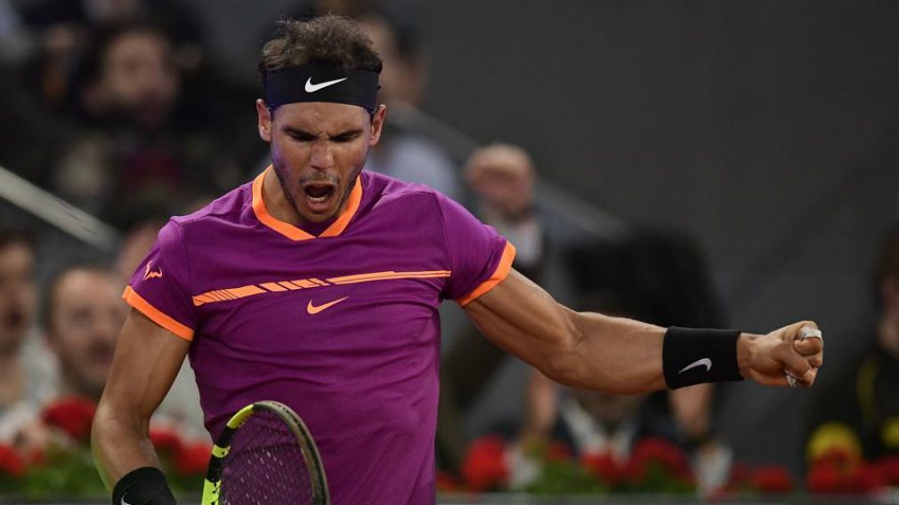 Rafael Nadal berhasil mengalahkan Novak Djokovic di babak semifinal Madrid Terbuka 2017. Copyright: © AFP