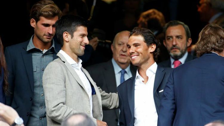 Novak Djokovic dan Rafael Nadal saat menonton Real Madrid. Copyright: © Getty Images