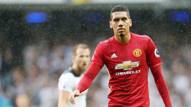 Chris Smalling, bek tengah Manchester United. Copyright: © John Peters/Man Utd via Getty Images