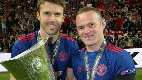 Michael Carrick dan Wayne Rooney . Copyright: © John Peters/Man Utd via Getty Images