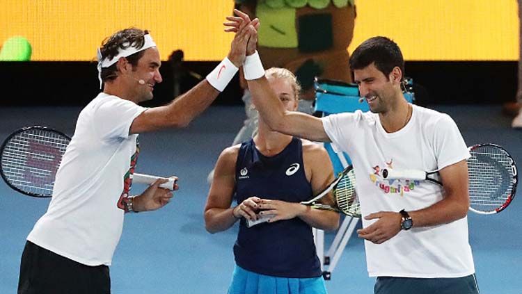 Novak Djokovic dan Roger Federer. Copyright: © INDOSPORT