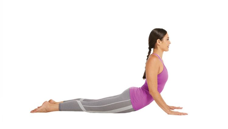 Cobra Pose. Copyright: © Yoga Journal.