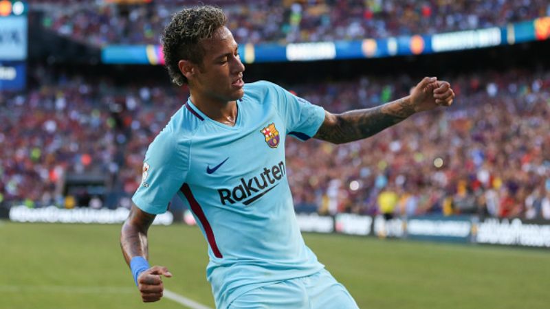 Selebrasi Neymar pasca mencetak gol ke gawang David De Gea. Copyright: © INDOSPORT