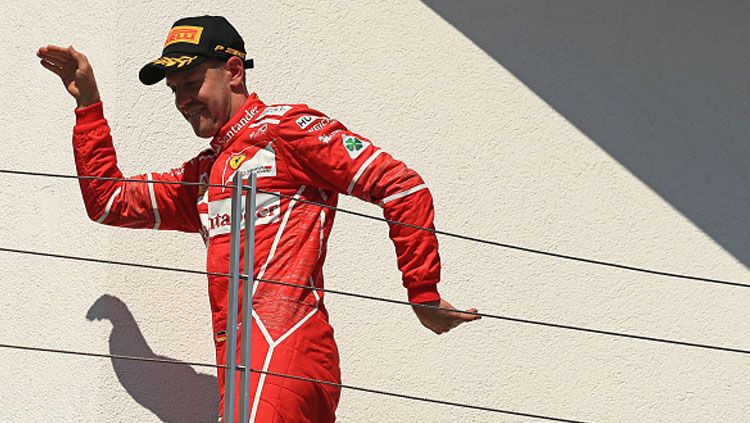 Pembalap Ferrari, Sebastian Vettel. Copyright: © INDOSPORT