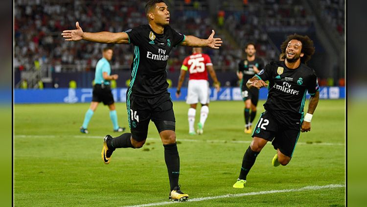 Casemiro mencetak gol untuk Real Madrid ke gawang Man United. Copyright: © Getty Images