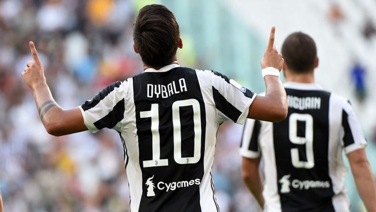 Paulo Dybala sumbang satu gol ke gawang Cagliari. Copyright: © Getty Images