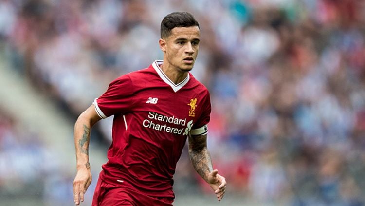 Philippe Coutinho saat berseragam Liverpool. Copyright: © getty images