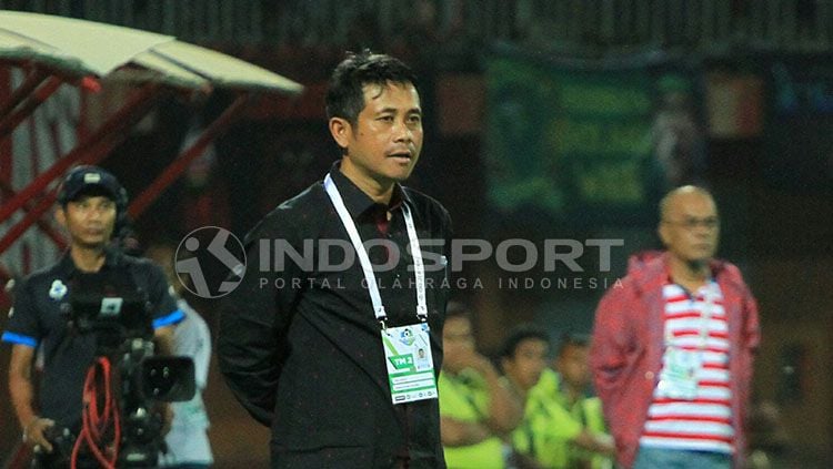 Pelatih Arema FC, Joko Susilo, memuji penampilan anak asuhnya usai mengalahkan Mitra Kukar. Copyright: © INDOSPORT/Ian Setiawan