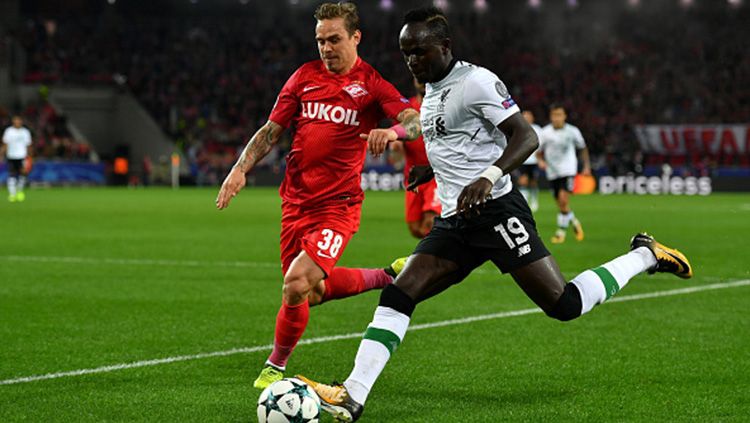 Andrei Eschenko dan Sadio Mane. Copyright: © getty images