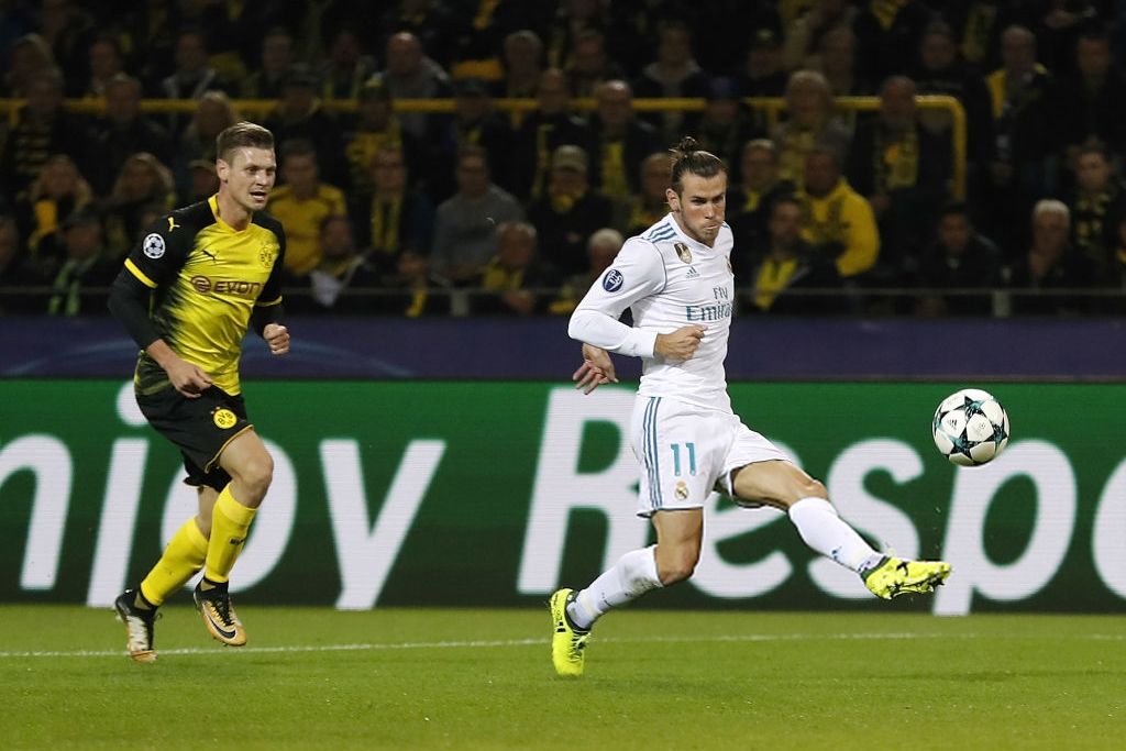 Gareth Bale mencetak gol pembuka pada menit ke-18' di Signal Iduna Park. Copyright: © getty images