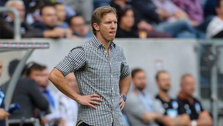 Julian Nagelsmann memberikan arahan kepada anak asuhanya untuk terus bermain menekan saat menghadapi Paris Saint-Germain dalam semifinal Liga Champions. Copyright: © getty images