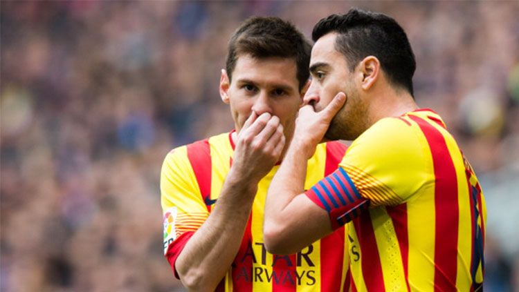 Lionel Messi dan Xavi Hernandez saat masih menjadi rekan tim di Barcelona. Copyright: © INDOSPORT