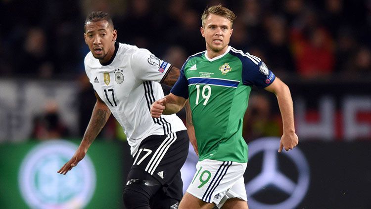 Jerome Boateng akan kembali memperkuat Jerman saat menghadapi Irlandia Utara. Copyright: © DFB