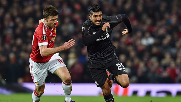 Michael Carrick dan Emre Can. Copyright: © INDOSPORT