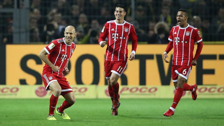 Arjen Robben cetak gol pembuka dalam laga Borussia Dortmund vs Bayern Munchen. Copyright: © Getty Images