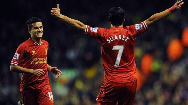 Luis Suarez dan Philippe Coutinho saat membela Liverpool. Copyright: © Google