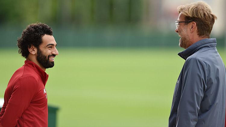 Jurgen Klopp dan Mohamed Salah. Copyright: © Getty Images