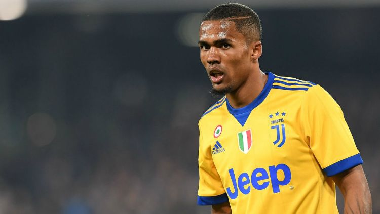 Douglas Costa, pemain Juventus. Copyright: © INDOSPORT