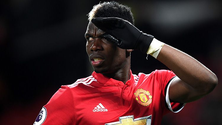 Juventus dan Real Madrid dikabarkan sama-sama tertarik mendatangkan bintang Manchester United, Paul Pogba. Copyright: © Getty Images