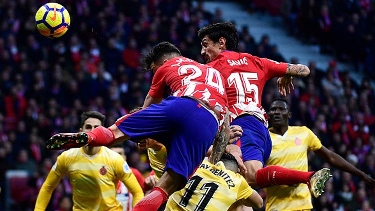 Real Madrid dikabarkan tengah mencoba merusak rencana Manchester United dan Chelsea untuk bek Atletico Madrid. Copyright: © Getty Images