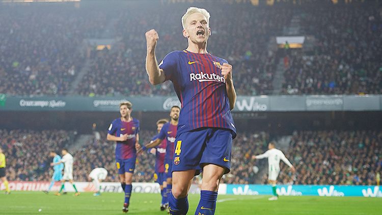 Ivan Rakitic kabarnya sudah tidak berminat hengkang dari klub La Liga, Barcelona. Copyright: © Getty Images