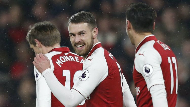 Gelandang Arsenal Aaron Ramsey saat merayakan gol ke gawang Everton. Copyright: © Getty Images