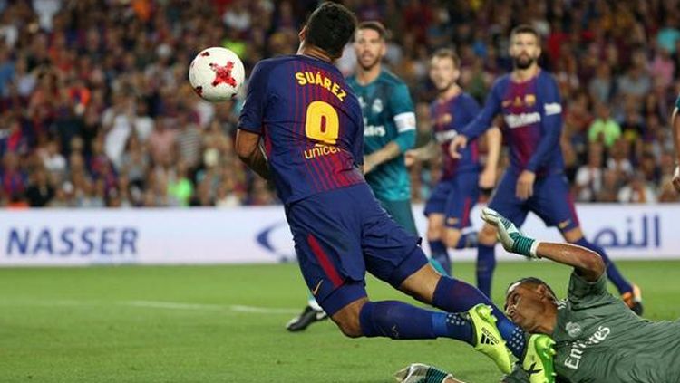 Luis Suarez diving saat melawan Real Madrid. Copyright: © Getty Images