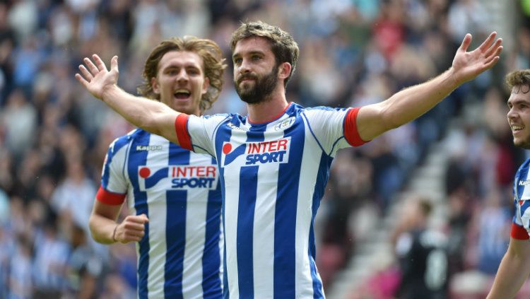 Penyerang Wigan Athletic Will Grigg. Copyright: © The Sun