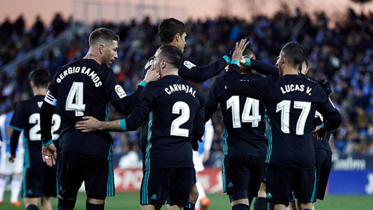 Pemain Real Madrid melakukan selebrasi. Copyright: © Getty Images
