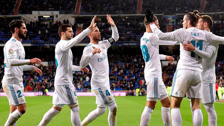 PAra pemain Real Madrid melakukan selebrasi usai Bale cetak gol. Copyright: © Getty Images