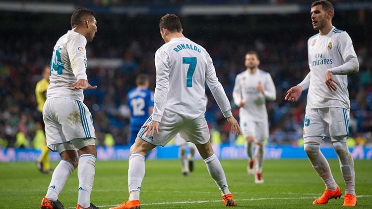 Selebrasi Cristiano Ronaldo usai mencetak gol ke gawang Getafe. Copyright: © Getty Images
