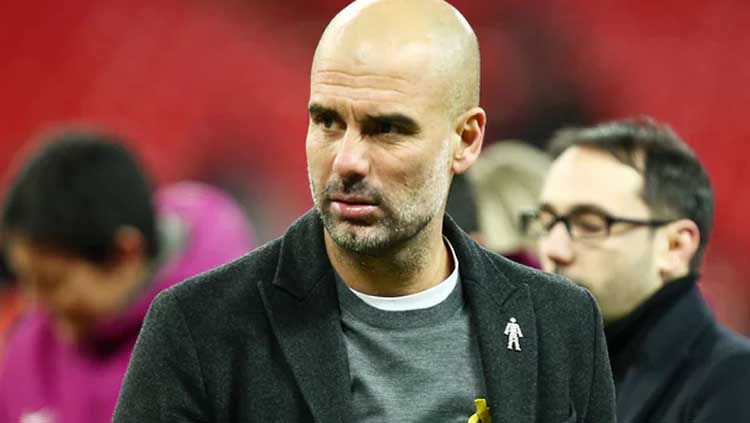 Pep Guardiola, pelatih Manchester City. Copyright: © The Guardian