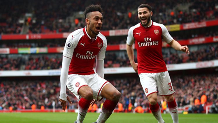 Aubameyang menjadi pemain kedua Arsenal yang mencetak gol ke gawang Watford di pekan ke-30 Liga Primer Inggris. Copyright: © Getty Images