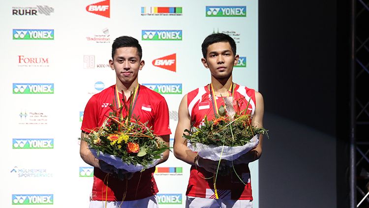 Ganda putra Indonesia, Fajar Alfian dan Muhammad Rian Ardianto gagal meraih gelar Jerman Terbuka 2018 setelah takluk dua gim langsung dari ganda Jepang, Takuto Inoue dan Yuki Kaneko. Copyright: © HUMAS PP PBSI