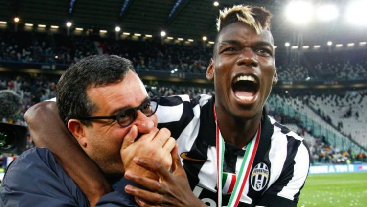 Pogba dan sang agen, Mino Raiola, saat membela Juventus. Copyright: © Getty Images