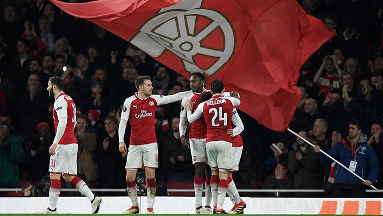 Aksi selebrasi pemain Arsenal lolos ke 8 besar Liga Europa. Copyright: © Getty Images