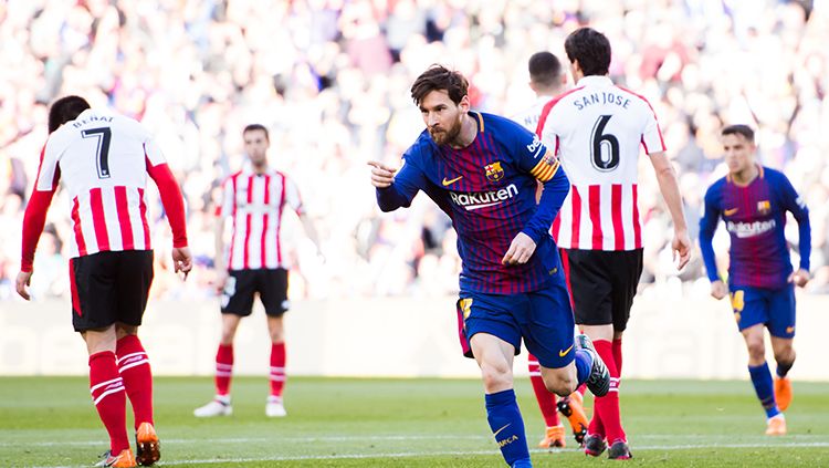 Lionel Messi usai mencetak gol kedua untuk Barcelona. Copyright: © Getty Images