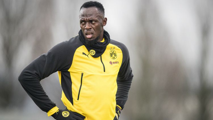 Usain Bolt swaktu ikut latihan di Borussia Dortmund. Copyright: © INDOSPORT