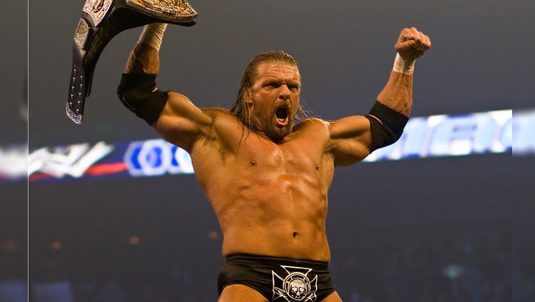 Triple H menjadi salah satu pegulat terbaik WWE yang pernah memegang sabuk juara kelas berat. Copyright: © Wikimedia Commons