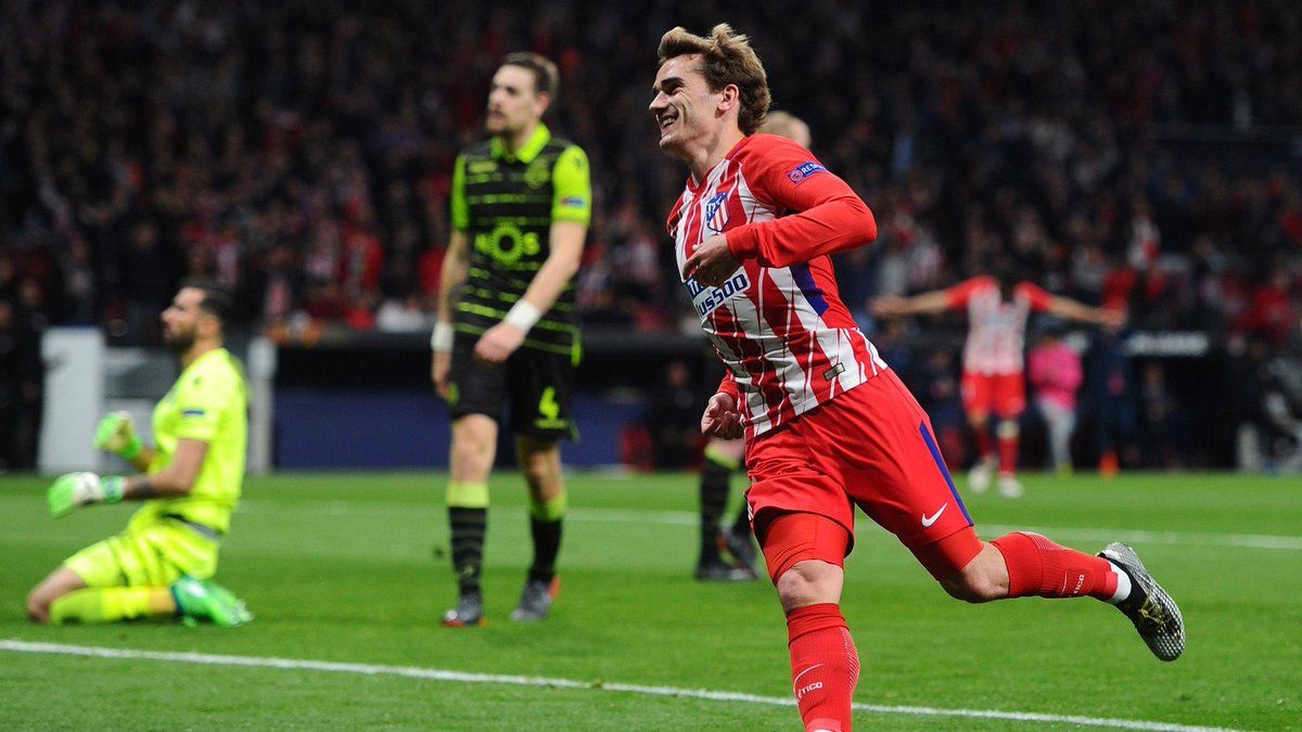 Antoine Griezmann berselebrasi usai mencetak gol ke gawang Sporting Lisbon. Copyright: © Getty Image