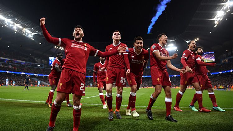 Pemain Liverpool selebrasi atas gol pertama. Copyright: © Getty Images
