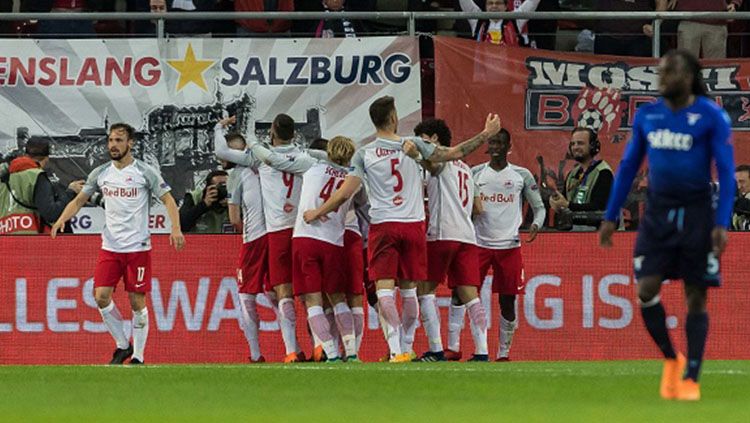 Raksasa Liga Inggris, Liverpool, dikabarkan tengah adakan pertemuan dengan Red Bull Salzburg terkait usaha mereka memboyong bintang Asia, Takumi Minamino. Copyright: © Getty Images