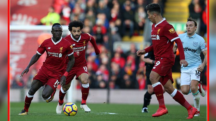 Trio striker Liverpool, Sadio Mane, Mohamed Salah, dan Roberto Firmino. Copyright: © Getty Images