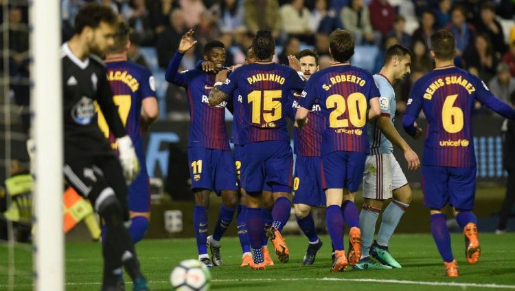 Para pemain Barcelona tengah merayakan gol. Copyright: © Getty Images